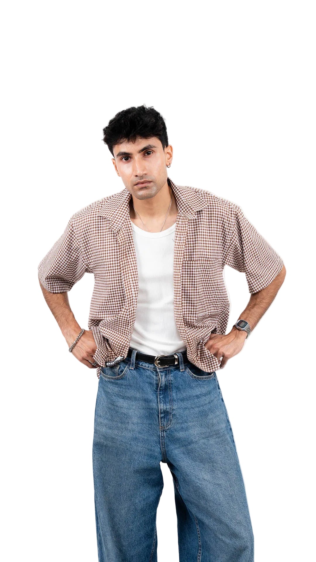 Man wearing a checkered shirt, white t-shirt, blue jeans, and black shoes on a white background