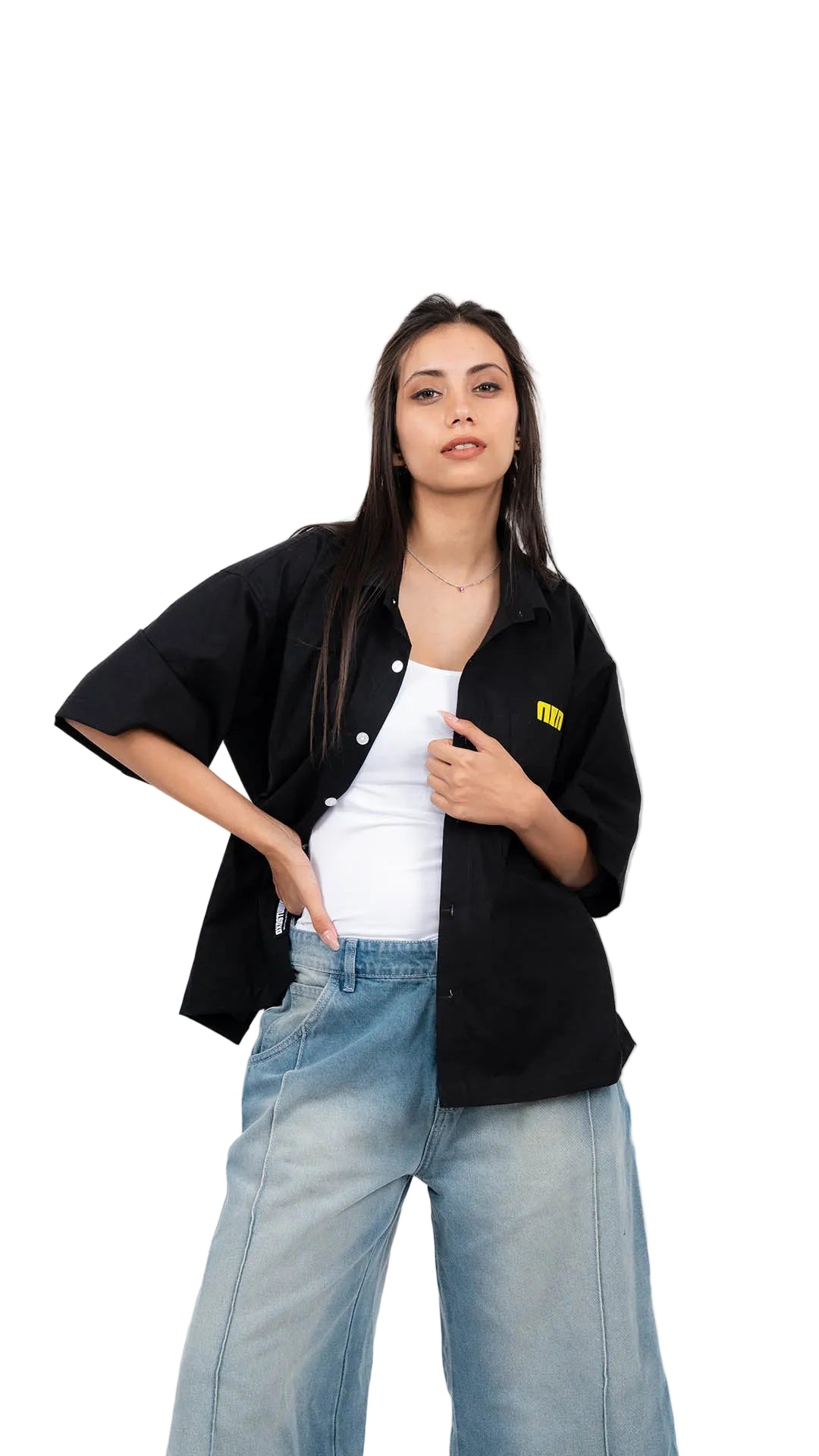 Woman wearing a black jacket with a dxdstudios logo, white shirt, and blue jeans on a white background