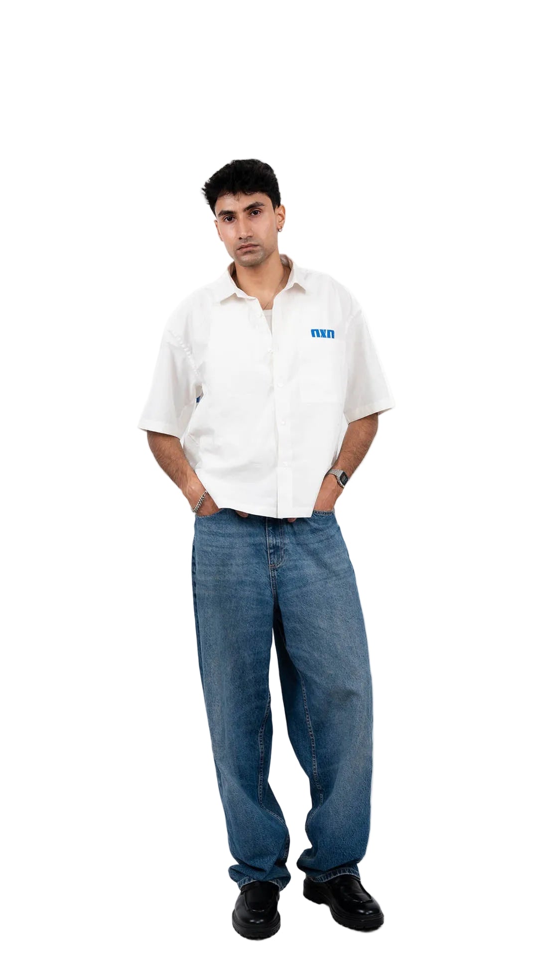 Person wearing a white shirt with a dxdstudios logo and blue jeans on a white background